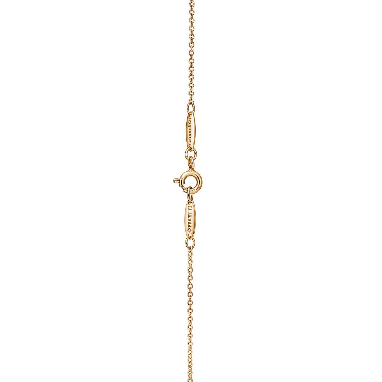 TIFFANY ELSA PERETTI® BEAN® DESIGN PENDANT IN YELLOW GOLD, 6.5 MM